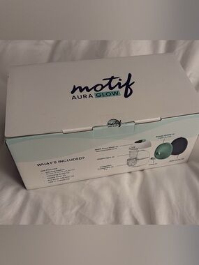 Brand new, unopened Motif Aura Glow Breast Pump – Mint